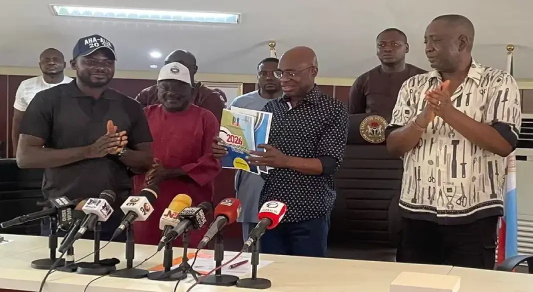Alia, flanked by his Deputy, receives the expression of interest and nomination forms from the leaderships of NUP and BMOA